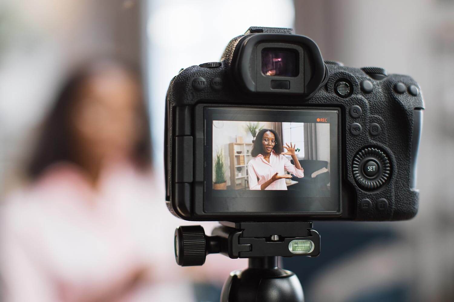 woman being filmed on slr woman being filmed on slr