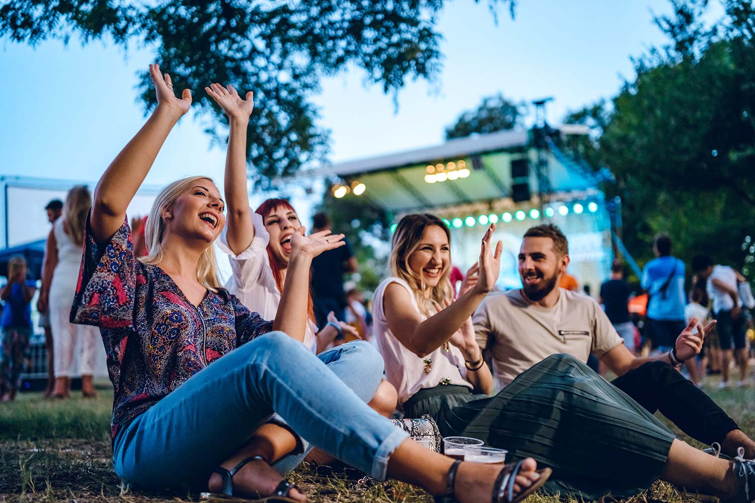 group-of-friends-enjoying-an-outdoor-concert