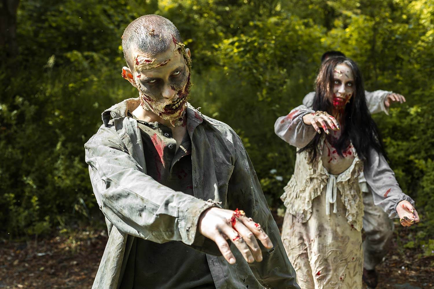 Zombie actors at a scare park Zombie actors at a scare park
